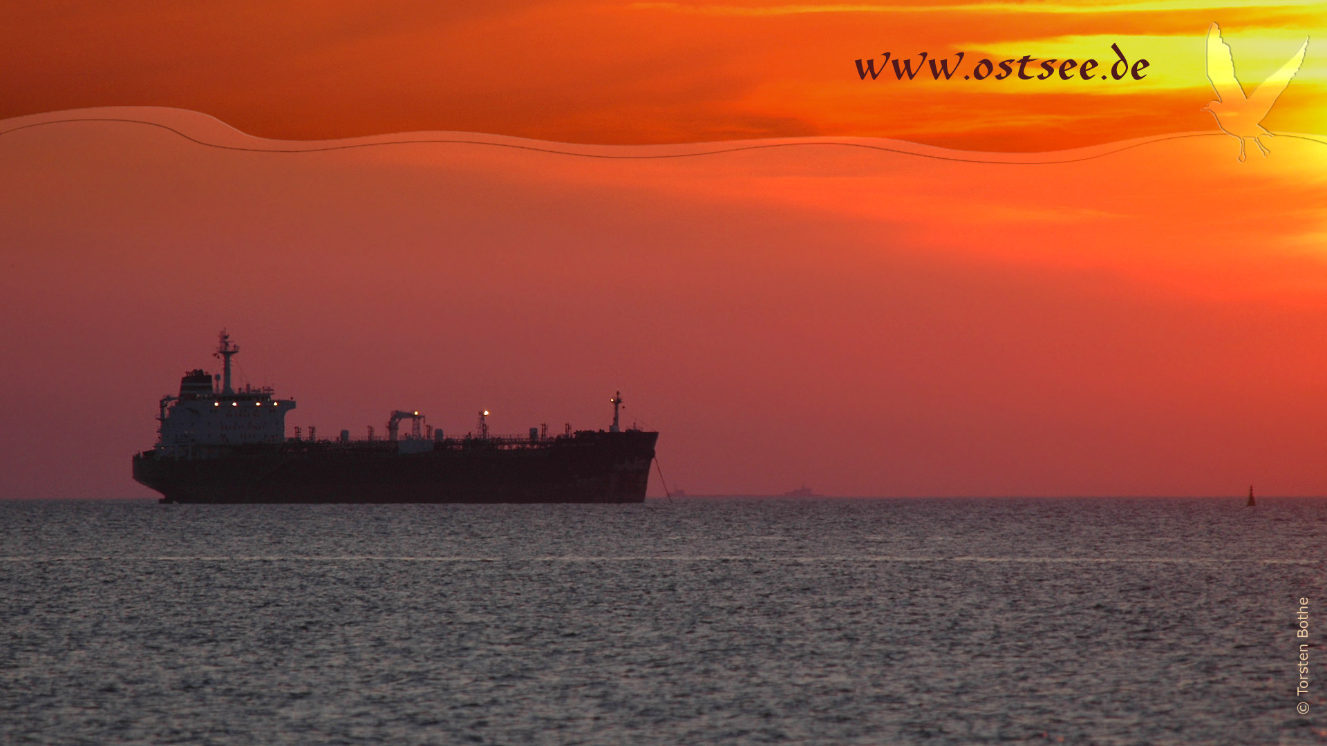 Hintergrundbild: Sonnenuntergang an der Ostsee