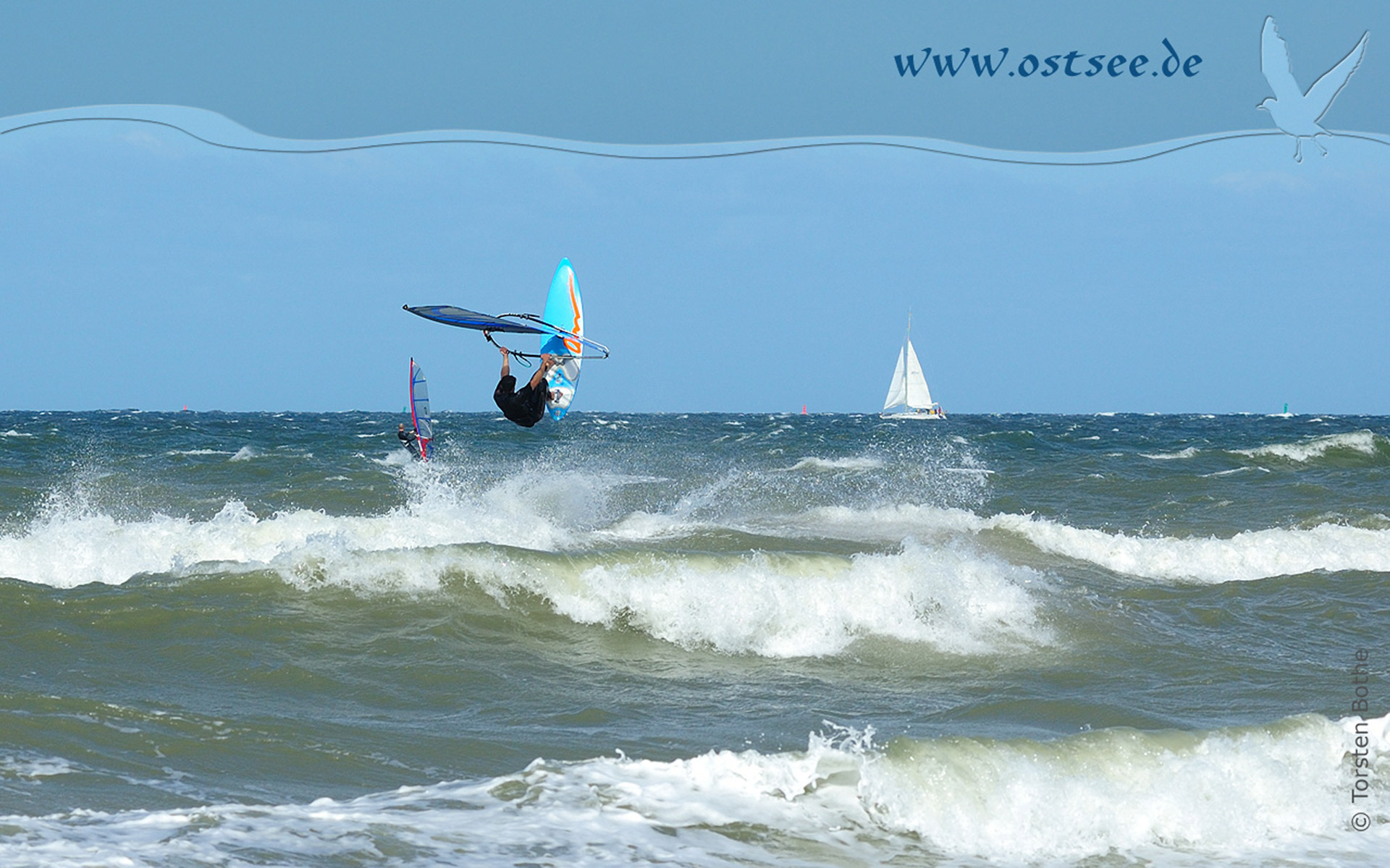 Hintergrundbild: Windsurfer auf der Ostsee