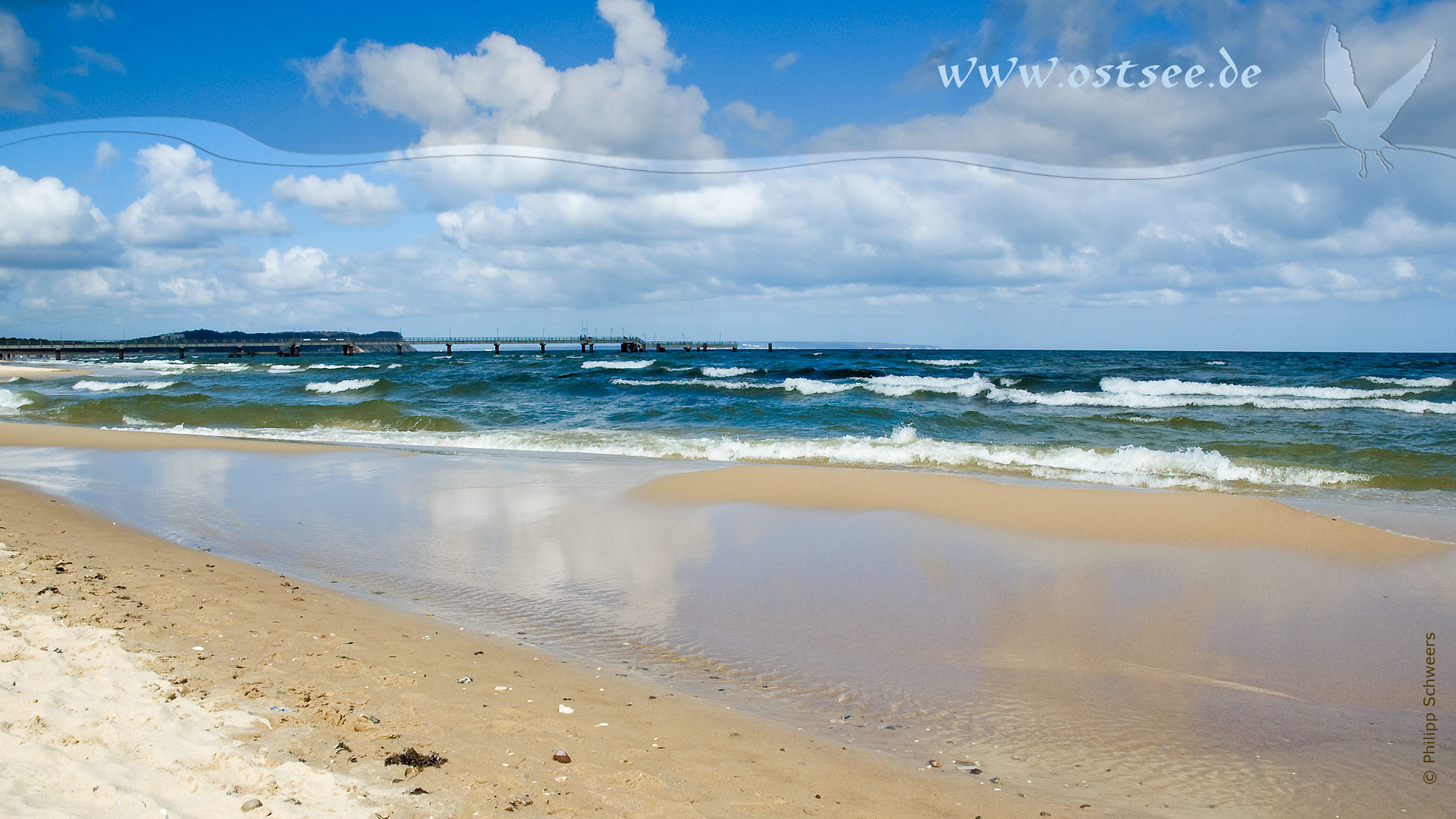 Hintergrundbild: Strand und Seebrücke an der Ostsee Hintergrundbild: Strand und Seebrücke an der Ostsee